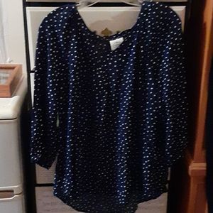 Navy blue w/ white polka dot pattern shirt
